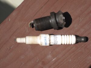 Fouled spark plug and insulator