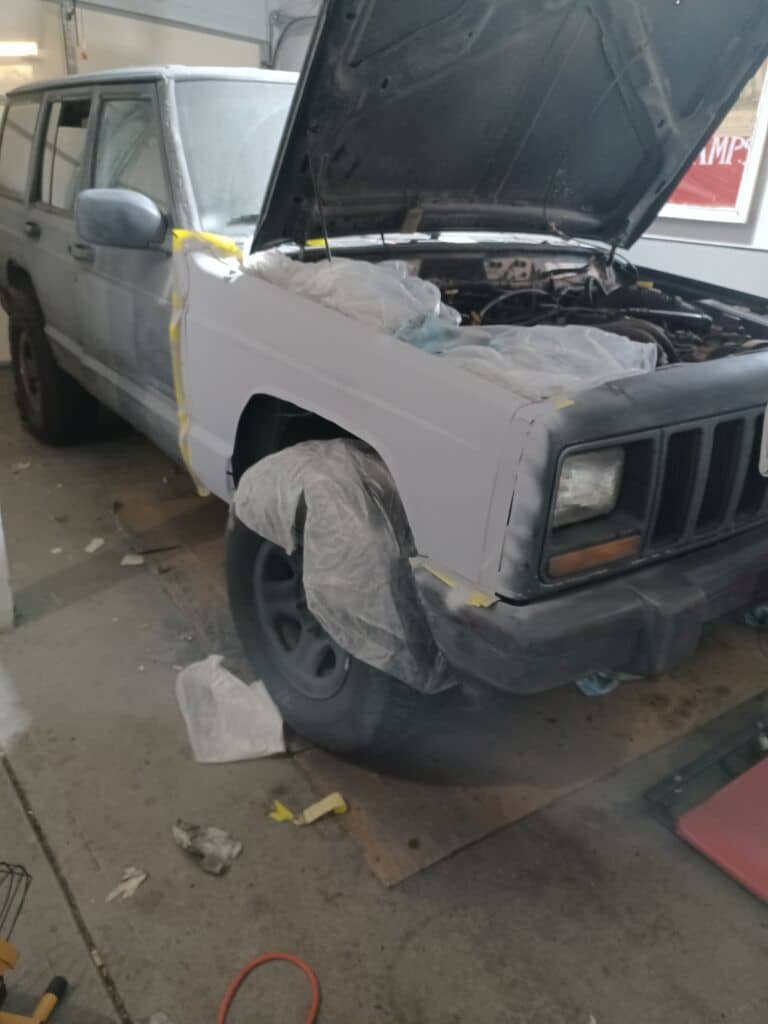 Jeep Cherokee XJ priming right front fender